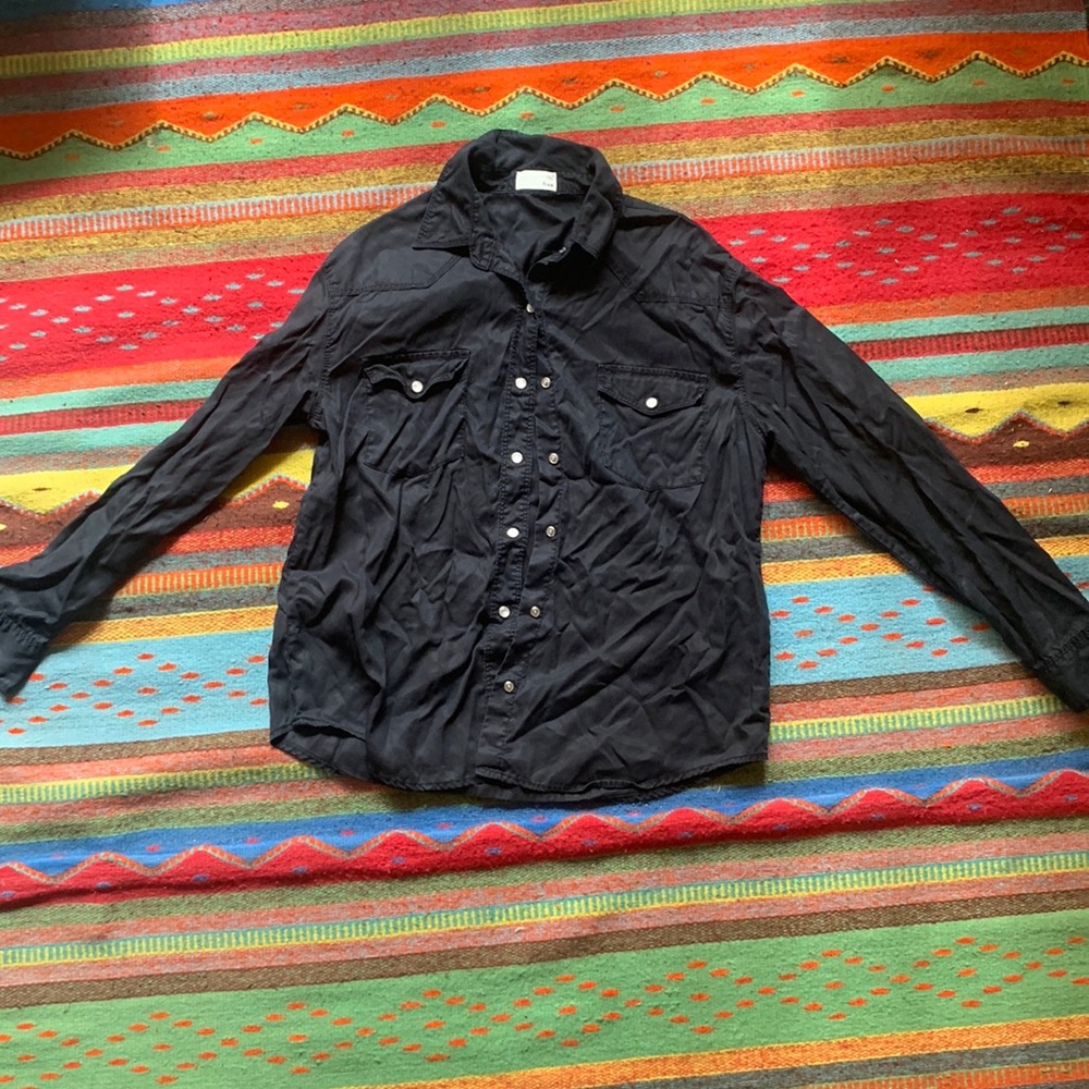 Black purl button up top